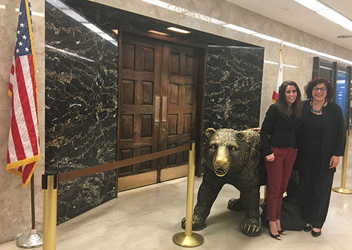 From left: NCIP Staff Attorney Melissa O’Connell and NCIP Executive Director Hadar Harris outside Governor Brown’s office during a recent trip to the State Capitol. Photo: Hadar Harris.