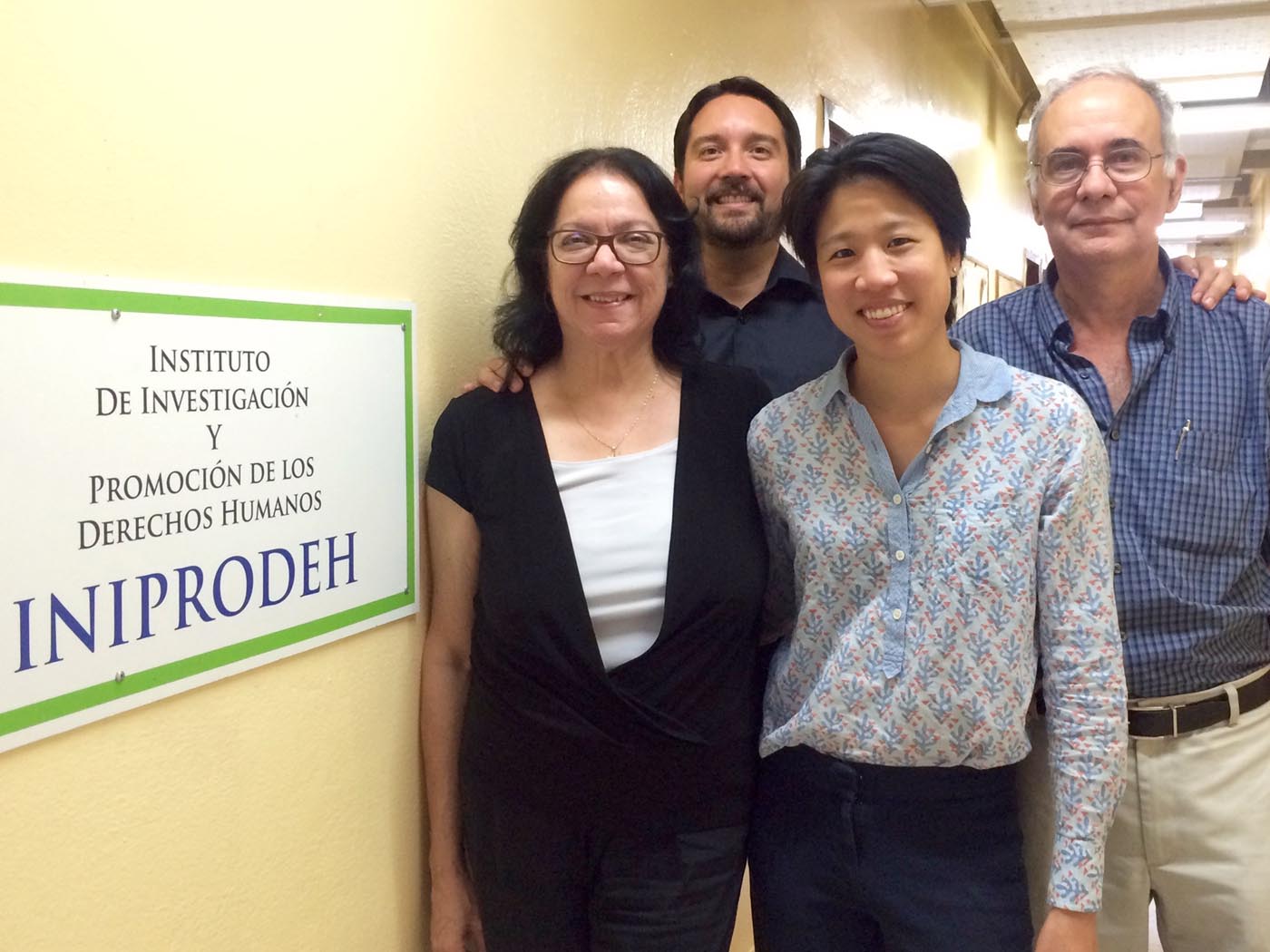 IHRC student Cindy Chu and IHRC director Francisco Rivera with clients Lina Torres and Manuel Torres
