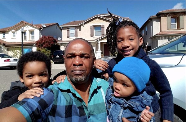 Maurice Caldwell with his kids