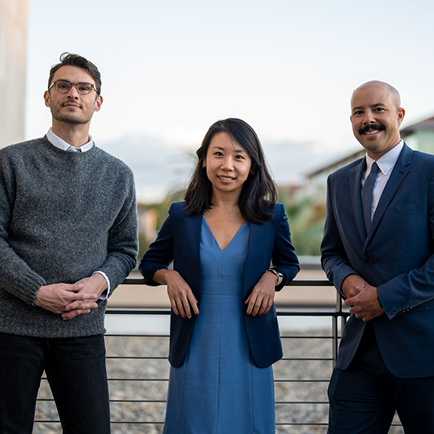 3 faculty members posing for the image