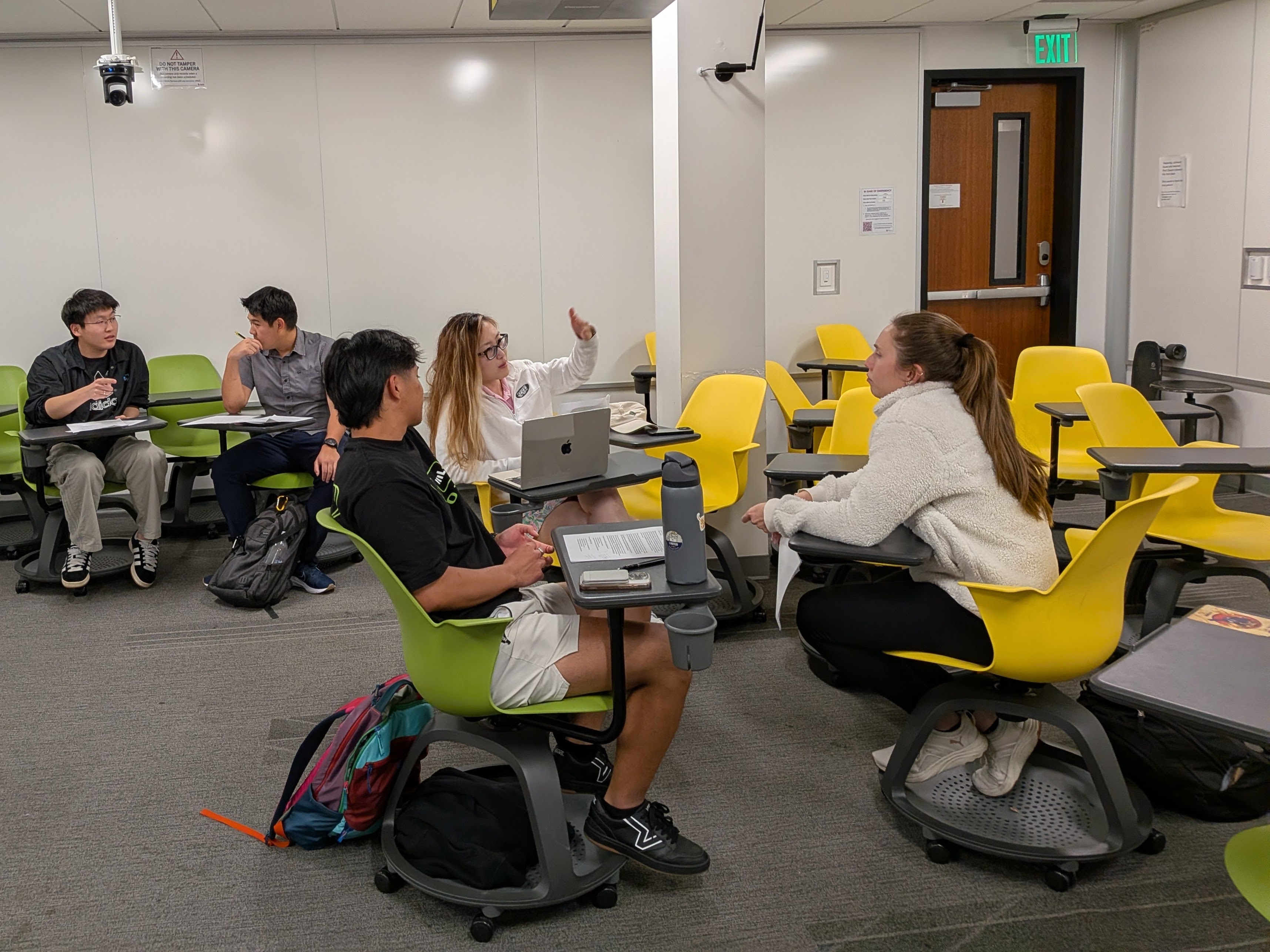 Students engaged in a mock negotiation