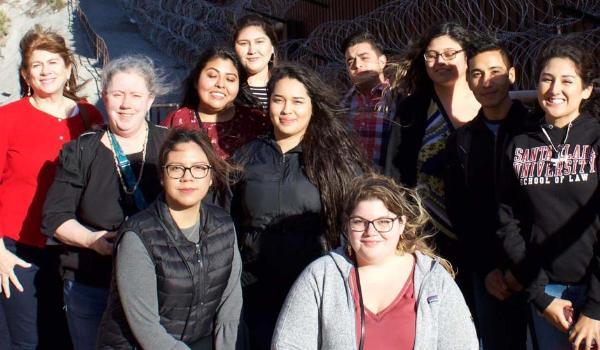 Students at the border wall