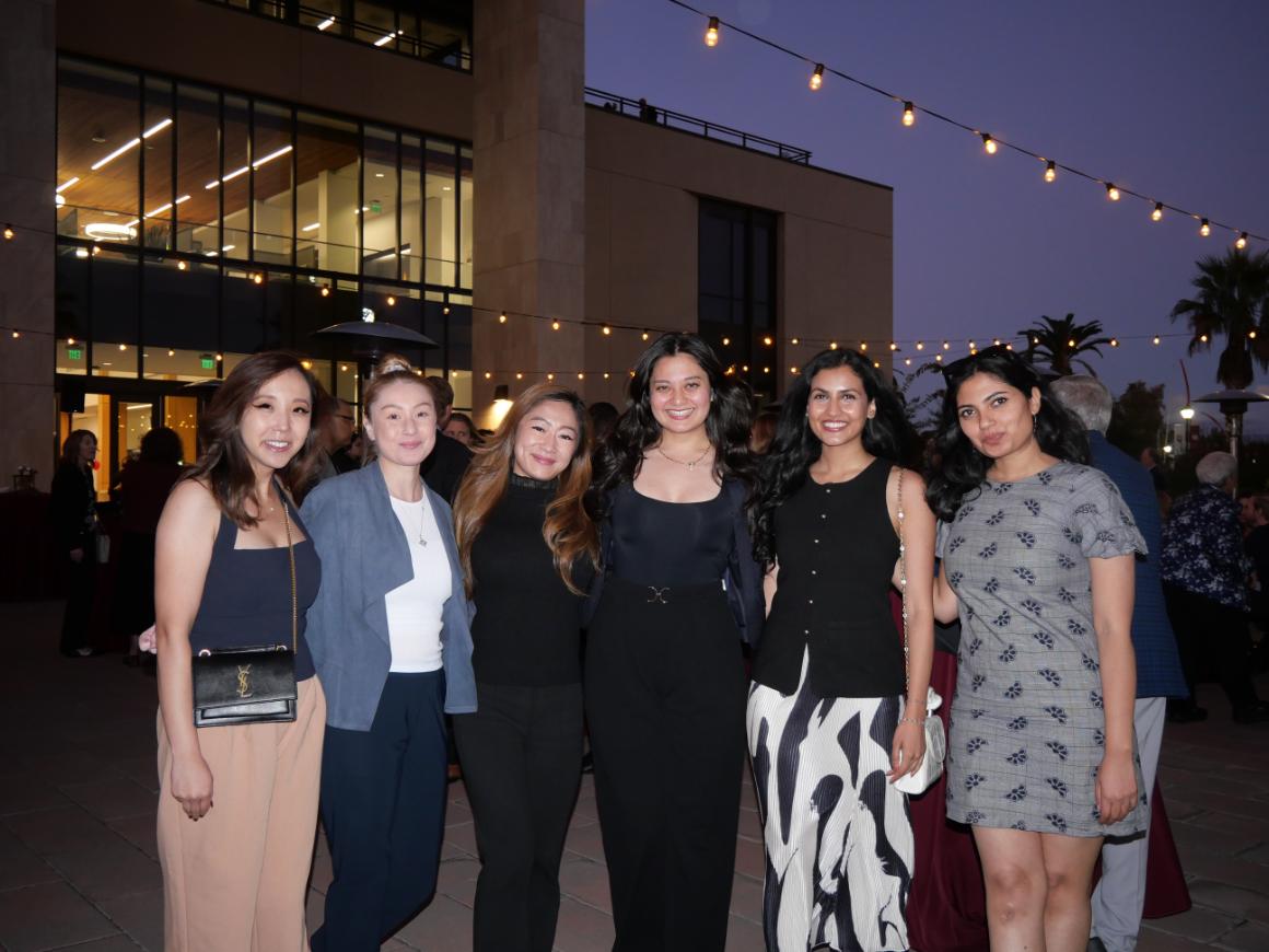 A group of alumni smiling