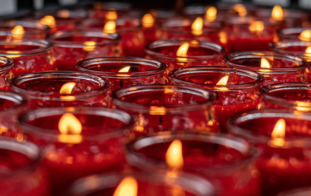 red candles, red mass