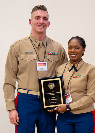  Major Janae Lawson and Capt. Joseph Guthmann, United States Marine Corps
