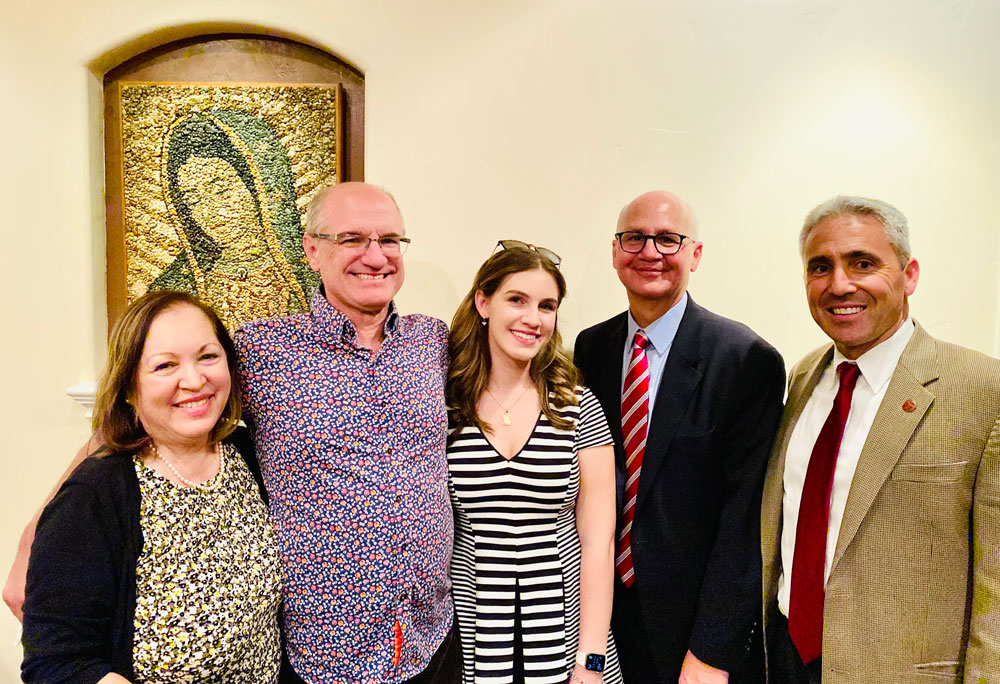 Left to right: Katy, Stephen, and Caitlin Gronowski, Dean Michael Kaufman, Senior Assistant Dean Steve O’Brien.