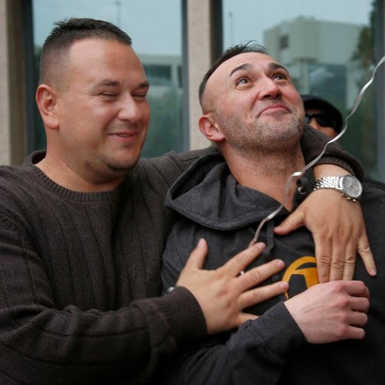 Lionel Rubalcava (right), a free man for the first time in 17 years is embraced by his brother Rolando Rubalcava. (Karl Mondon/Bay Area News Group)