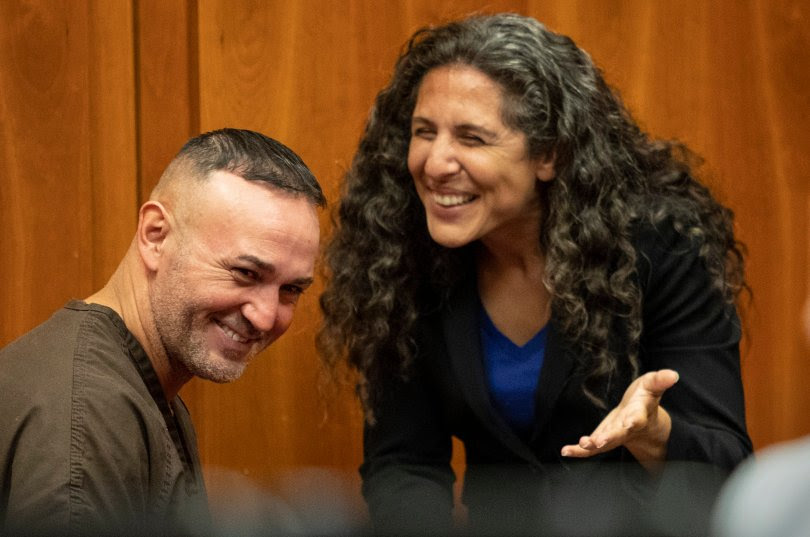 Lionel Rubalcava talks with NCIP attorney Paige Kaneb before his attempted murder conviction was dismissed. (Karl Mondon/Bay Area News Group)