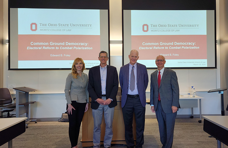 Edward B. Foley, director of election law at Ohio State & Charles W. Ebersold, and Florence Whitcomb Ebersold Chair in Constitutional Law, Dean Michael Kaufman, Professor David Sloss, and Caitlin Robinett Jachimowicz