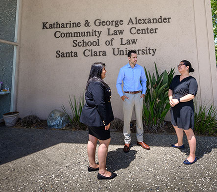 Law students in front of Katharine & George Alexander Community Law Center building